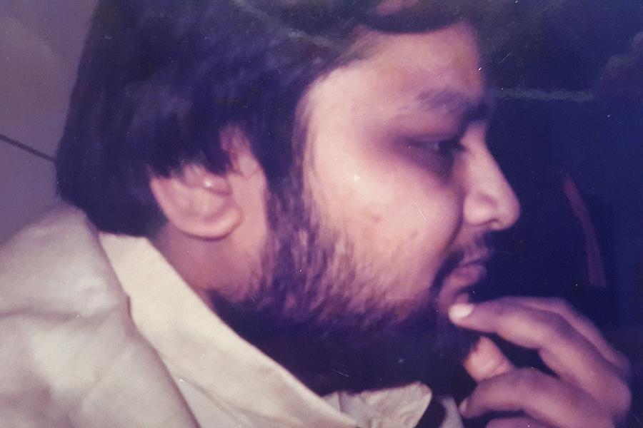 Brahmachari Girish Ji working on some serious matter on computer at his office at MERU, Holland. Winter 1993